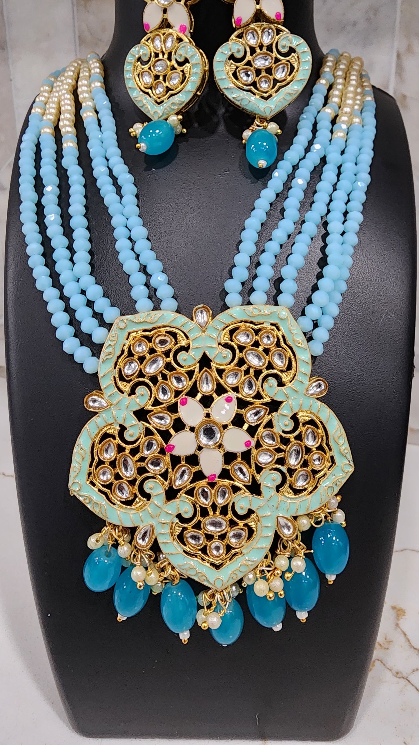 Beautiful Sky Blue Necklace with lotus pendant and matching earings