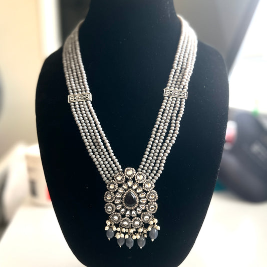 Multi-strand beaded necklace with antique finish and kundan