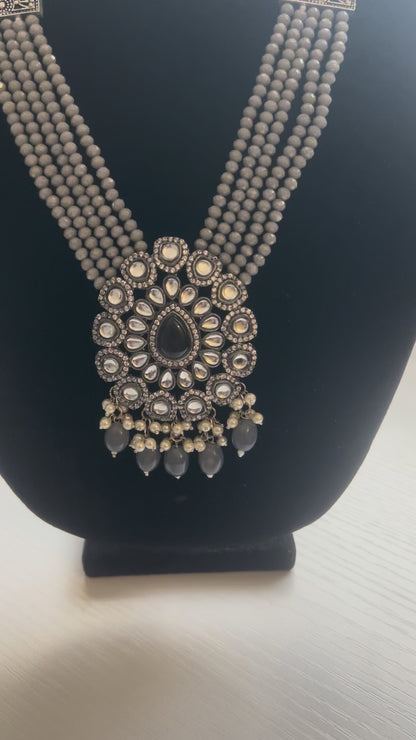Multi-strand beaded necklace with antique finish and kundan